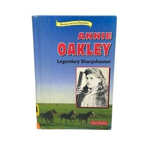 ANNIE OAKLEY: LEGENDARY SHARPSHOOTER Jean Flynn Biography of the Wild West Icon